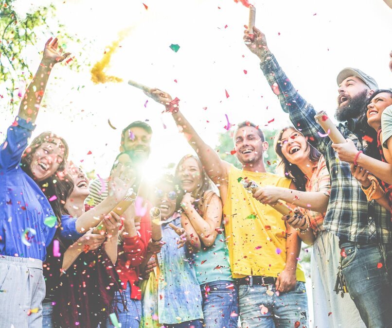 Happy-Group-of-Friends-Throwing-Confetti-at-a-Party-1.jpg