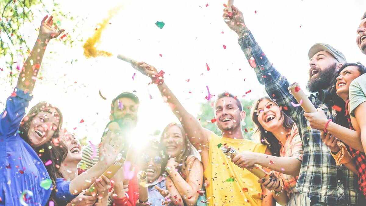 Happy-Group-of-Friends-Throwing-Confetti-at-a-Party-scaled.jpg